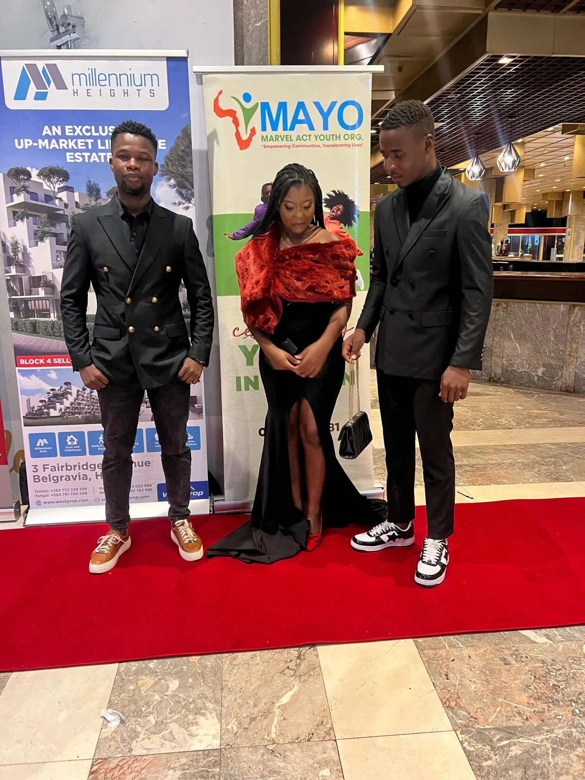 Abel Mavura with colleagues at a MAYO awards evening